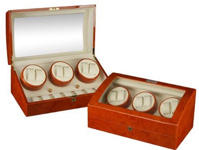 Mahogany Wood Finish 6 Winder With 7 Additional Storage Spaces, Three Turntable With 4 Program Settings.