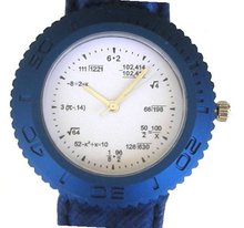 "Math Dial" Shows Pop Quiz Math Equations At Each Hour Indicator on the White Dial of the Polished Chrome Sport with a Blue Decorative Bezel and a Blue Leather Strap