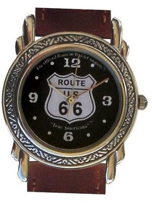 Western Style Route 66 Collectible By the Official Route 66 Company Has a Round Polished Chrome Case with Artistic Decorative Black Enamel Embossing and Brown Western Style Leather Strap