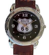 Western Style Route 66 Collectible By the Official Route 66 Company Has a Round Shape Polished Chrome Case with Artistic Decorative Embossing and Brown Western Style Leather Strap
