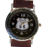 Western Style Route 66 Collectible By the Official Route 66 Company Has a Round Shape Polished Chrome Case with Artistic Decorative Black Enamel Embossing and Brown Western Style Leather Strap
