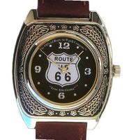 Western Style Route 66 Collectible By the Official Route 66 Company Has a Tonneau Shape Polished Chrome Case with Artistic Decorative Black Enamel Embossing and Brown Western Style Leather Strap