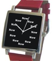 "Now" Is the Time That Is Shown Each Hour on the Black Dial of the Polished Chrome Square Shape with a Red Leather Strap