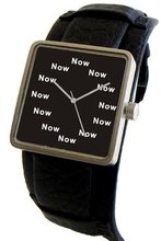 "Now" Is the Time That Is Shown Each Hour on the Dial of the Satin Finish 316L Stainless Steel Three Piece Case with a Wide Leather Strap