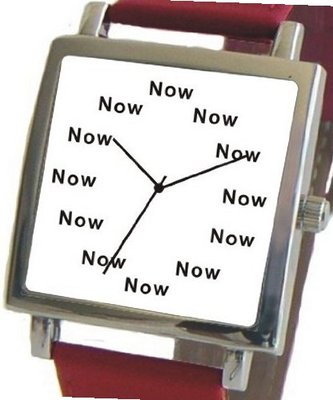 "Now" Is the Time That Is Shown Each Hour on the White Dial of the Polished Chrome Square Shape with a Red Leather Strap